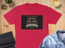 Load image into Gallery viewer, Red t-shirt with Independence Day graphic featuring US flags and stars.
