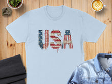 Load image into Gallery viewer, Light blue t-shirt with distressed USA flag lettering.
