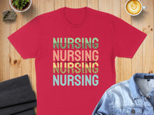 Load image into Gallery viewer, Red t-shirt with "Nursing is my superpower" text in colorful leopard print.
