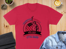 Load image into Gallery viewer, Red t-shirt with "Celebrating America's Semiquincentennial 1776-2026" and Statue of Liberty graphic.
