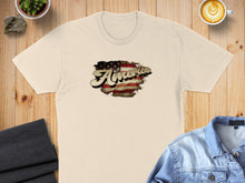 Load image into Gallery viewer, Cream t-shirt with distressed American flag graphic and "America" text.
