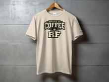 Load image into Gallery viewer, Cream t-shirt with "Powered by Coffee and RF" graphic.

