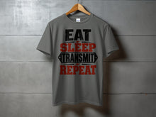 Load image into Gallery viewer, Gray t-shirt with black and red text: Eat Sleep Transmit Repeat.
