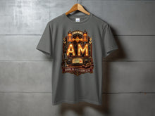 Load image into Gallery viewer, T-shirt with graphic of glowing vacuum tubes, vintage microphone, and radio dial.
