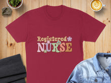 Load image into Gallery viewer, Maroon t-shirt with "Registered Nurse" text and colorful floral graphics.
