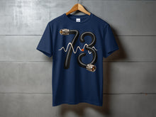 Load image into Gallery viewer, Navy t-shirt with a "73" graphic made of coiled cable and waveform.
