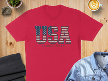 Load image into Gallery viewer, Red t-shirt with "USA" text in distressed American flag design.
