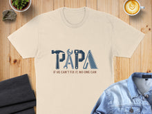 Load image into Gallery viewer, T-shirt with "PAPA" made of tools and text "IF HE CAN'T FIX IT, NO ONE CAN".
