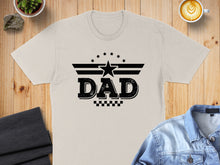 Load image into Gallery viewer, T-shirt with black "DAD" text and star graphic on a light background.
