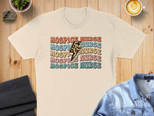 Load image into Gallery viewer, Hospice Nurse text with lightning bolt graphic on a cream t-shirt.
