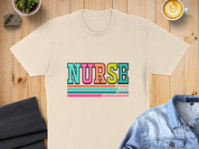 Load image into Gallery viewer, Cream t-shirt with "NURSE" in colorful block letters and phrases: strong, loyal, caring, compassionate.
