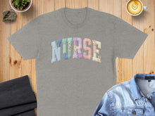 Load image into Gallery viewer, Gray t-shirt with "NURSE" spelled out in a patchwork of floral fabrics.
