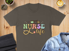 Load image into Gallery viewer, Nurse Life text with syringe and heart graphic on a brown t-shirt.
