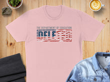 Load image into Gallery viewer, Pink t-shirt with "DEFEATED" in a distressed US flag design.
