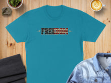 Load image into Gallery viewer, Turquoise t-shirt with "FREEDOM" text in American flag pattern.
