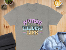 Load image into Gallery viewer, Grey t-shirt with "Nurse is the best life" text design.
