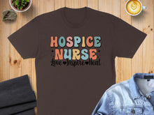Load image into Gallery viewer, Brown t-shirt with "HOSPICE NURSE Love Inspire Heal" text design.

