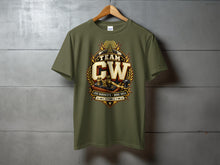 Load image into Gallery viewer, Olive green t-shirt with "TEAM CW" graphic featuring a telegraph key and radio tower.
