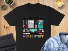 Load image into Gallery viewer, Black t-shirt with "Can't talk right now, doing nurse stuff" and medical icons.
