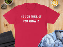 Load image into Gallery viewer, Red t-shirt with white text "HE'S ON THE LIST" and "YOU KNOW IT" with stars.
