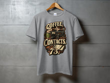 Load image into Gallery viewer, Gray t-shirt with "Coffee Contacts 73" design featuring a radio, microphone, and logbook.
