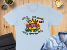 Load image into Gallery viewer, Light blue t-shirt with "Dad" graphic featuring crown and patriotic colors.
