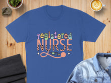 Load image into Gallery viewer, Registered Nurse t-shirt with colorful text and a syringe design.
