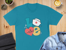 Load image into Gallery viewer, Teal t-shirt with "LOVE" design incorporating stethoscope, heart, and nurse hat.
