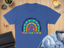 Load image into Gallery viewer, Blue t-shirt with "Pediatric Nurse" and rainbow stethoscope design.
