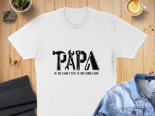 Load image into Gallery viewer, White t-shirt with "PAPA" in hammer, wrench, and saw graphic; "IF HE CAN'T FIX IT, NO ONE CAN."
