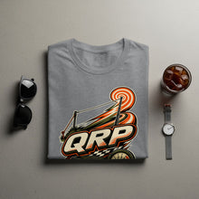 Load image into Gallery viewer, Grey t-shirt with "QRP" graphic featuring a target, antennas, and speedometer.
