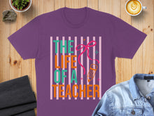 Load image into Gallery viewer, Purple t-shirt with "The Life of a Teacher" text and pencil graphic.

