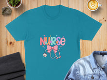 Load image into Gallery viewer, Teal t-shirt with "Nurse" text and stethoscope graphic.
