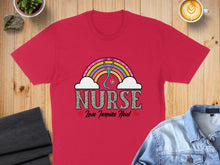 Load image into Gallery viewer, Red t-shirt with rainbow, stethoscope, and "Nurse Love Inspire Heal" text.
