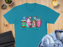 Load image into Gallery viewer, Turquoise t-shirt with "RCA Resident Care Assistant" and coffee illustrations.
