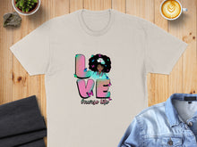 Load image into Gallery viewer, Beige t-shirt with "LOVE #nurse life" graphic featuring a woman with an afro.
