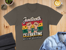 Load image into Gallery viewer, Juneteenth t-shirt celebrating black freedom with chained hands breaking.

