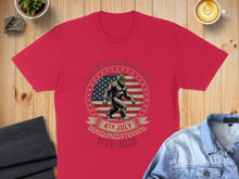 Load image into Gallery viewer, Red t-shirt with Big Foot graphic, American flag, and text "Celebrating America's 4th Semiquincentennial 1776-2026".
