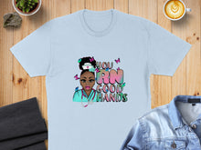Load image into Gallery viewer, Light blue t-shirt with nurse graphic and "You RN Good Hands" text.
