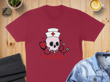 Load image into Gallery viewer, Burgundy t-shirt with skull, stethoscope, and "Nurselife" text.

