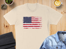 Load image into Gallery viewer, Cream t-shirt with distressed American flag design.
