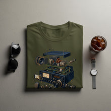 Load image into Gallery viewer, Olive t-shirt featuring an exploded diagram of a ham radio with a digital display.
