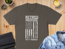 Load image into Gallery viewer, Brown t-shirt with American flag design and "Retired Mechanic Fix It Yourself" text.
