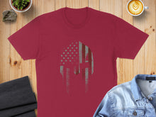 Load image into Gallery viewer, Maroon t-shirt with a distressed Spartan helmet graphic featuring US flag elements.
