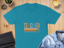 Load image into Gallery viewer, Teal t-shirt with "TEACHER" text and inspirational words.
