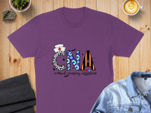 Load image into Gallery viewer, Purple t-shirt with "CNA Certified Nursing Assistant" in colorful, patterned letters.
