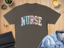 Load image into Gallery viewer, Brown t-shirt with "NURSE" in pastel patchwork lettering.
