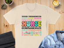 Load image into Gallery viewer, T-shirt with "NURSE" and medical terms in colorful lettering.
