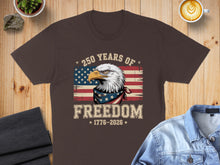 Load image into Gallery viewer, Brown t-shirt with eagle, American flag, and "250 Years of Freedom 1776-2026".
