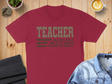 Load image into Gallery viewer, Burgundy t-shirt with "TEACHER" and motivational phrases in text.
